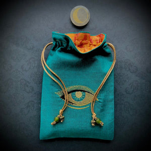 Embroidered Gold Eye Pouch